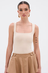 NEW STANDARD SQUARE NECK SLEEVELESS BODYSUIT IN BEIGE