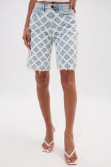 DISTRESSED AND STRESSED DENIM BERMUDA SHORT