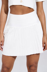 LEMONY EMILY PLEATED MINI SKIRT IN WHITE