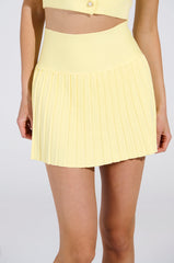 LEMONY EMILY PLEATED MINI SKIRT IN YELLOW