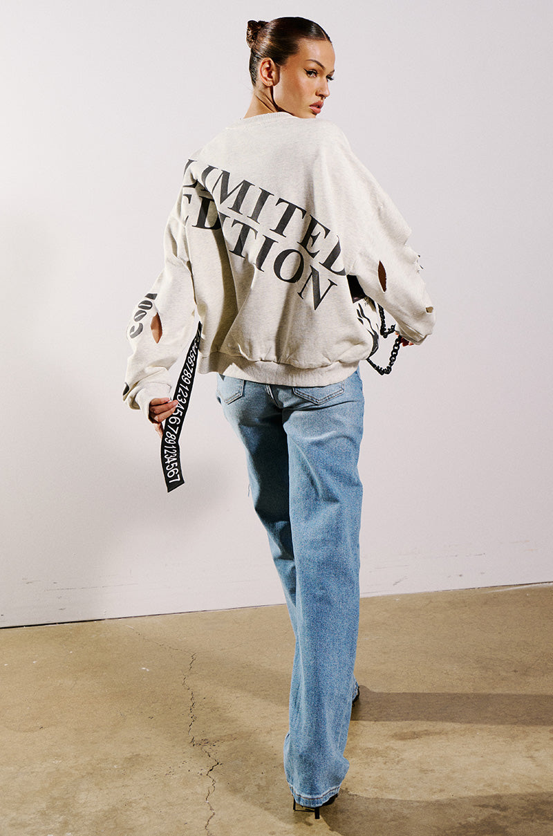 LIMITED EDITION CUT OUT GRAPHIC SWEATSHIRT
